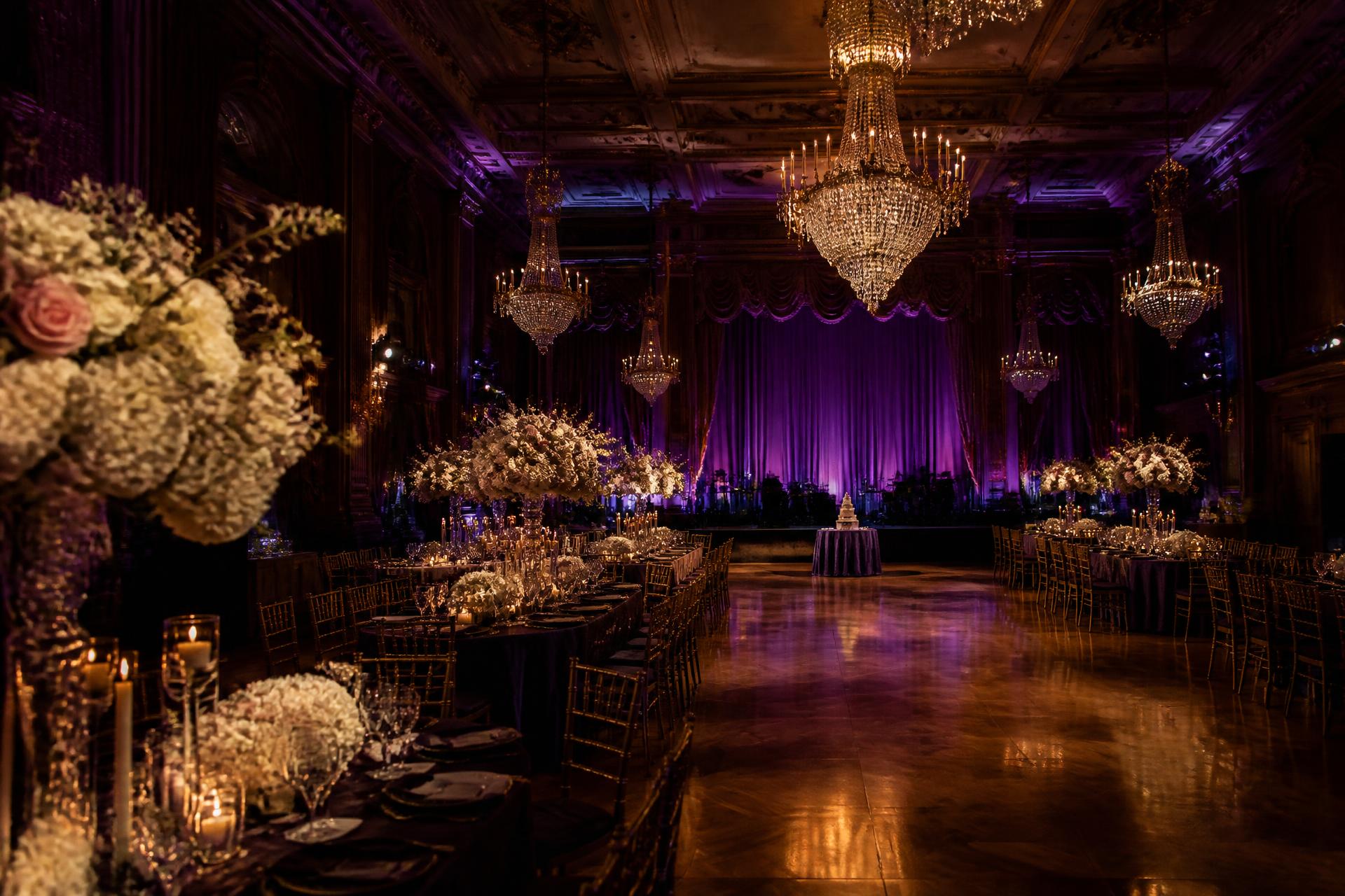 A cinematic view of a candlelit luxury ballroom evoking the future Adore venue